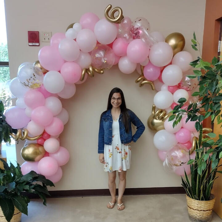 Pink, Gold, and white birthday party arch